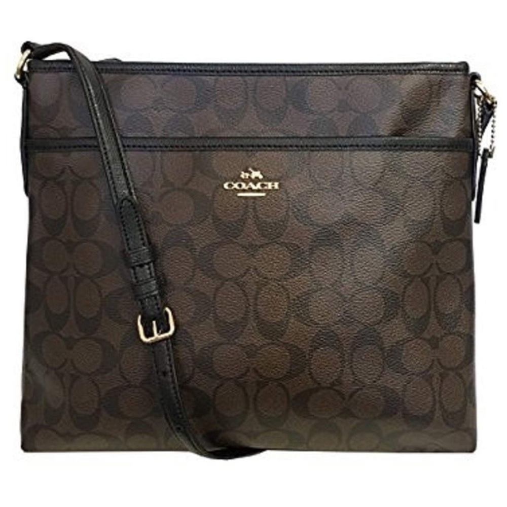Coach signature file crossbody bag.
